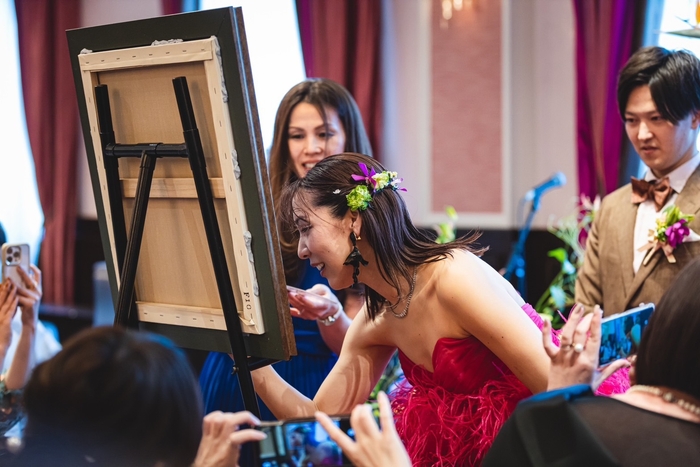 新郎新婦による筆入れで、更に特別な一枚に