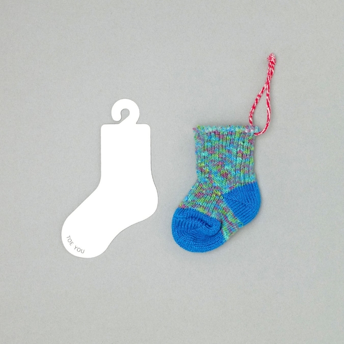 「TOE YOU(トゥー・ユー)」とついたメッセージカード