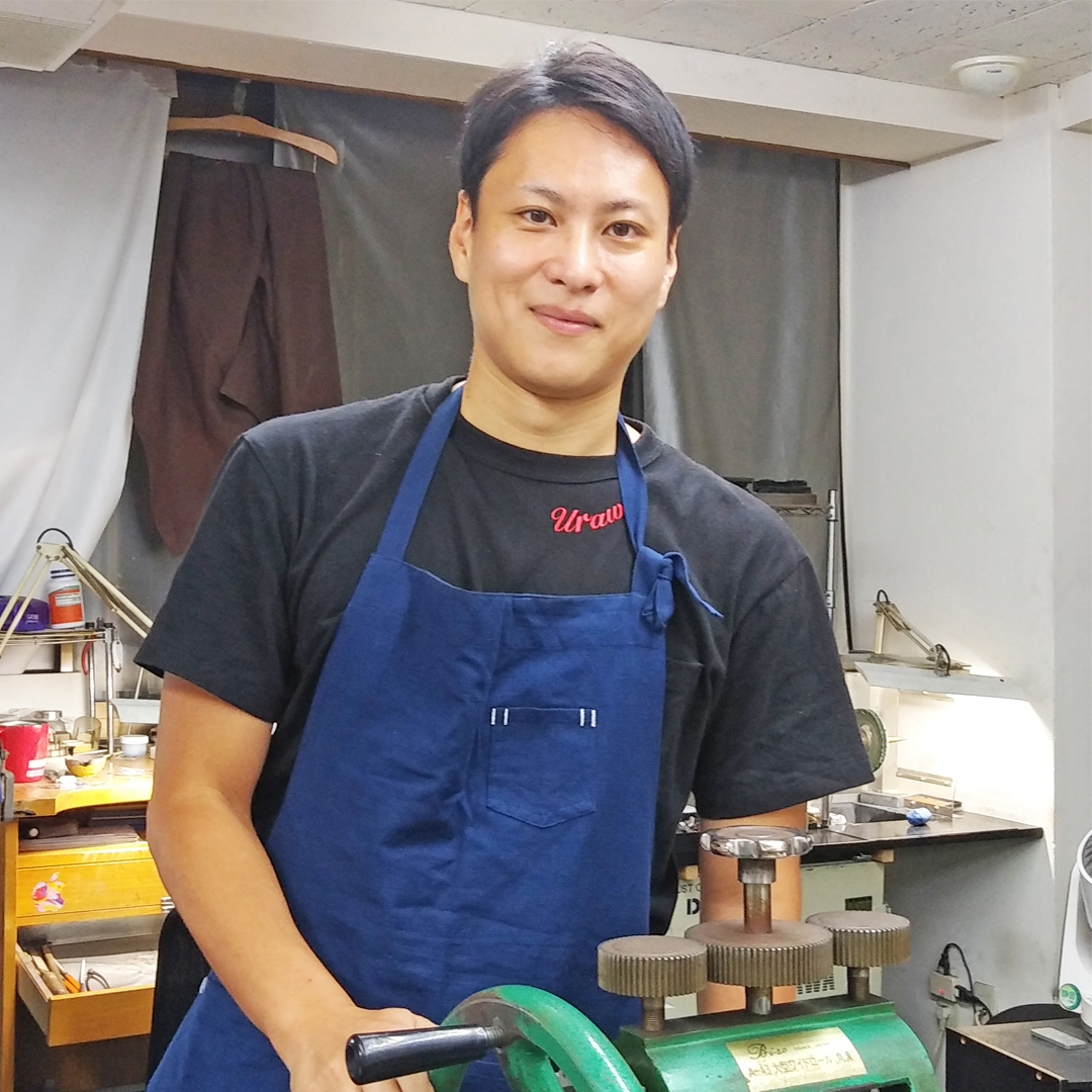 代表 国吉 栄一