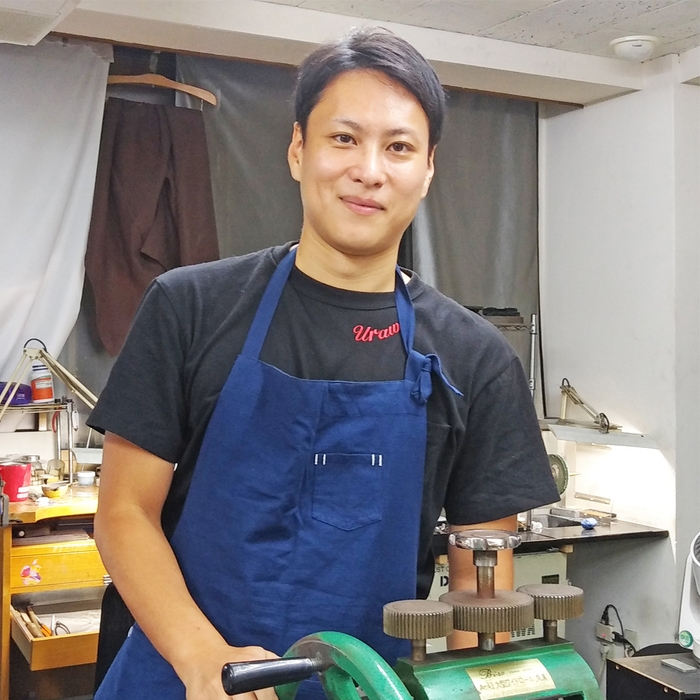 代表 国吉 栄一