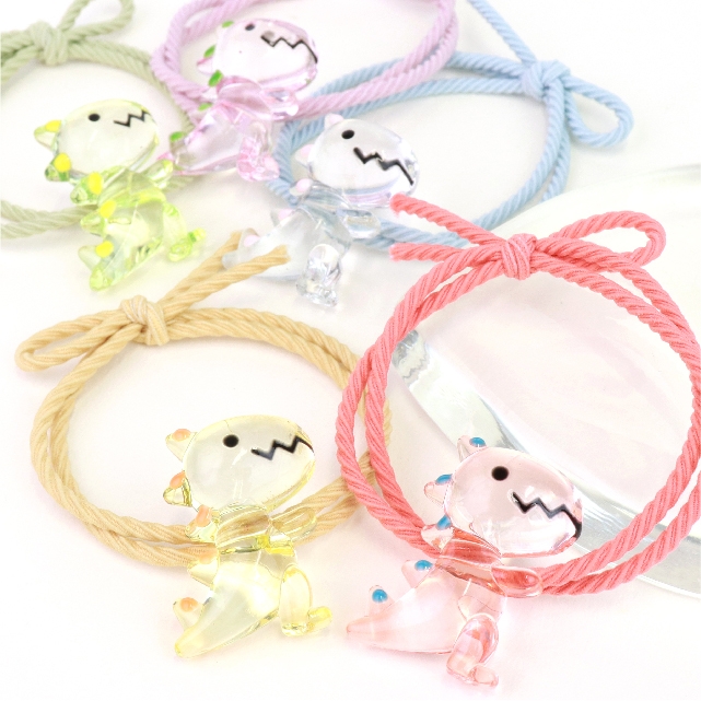 クリア恐竜つきヘアゴム 各180円