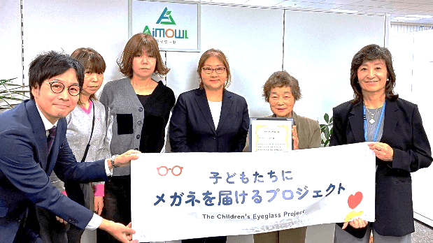 （写真左より）パリミキ九州北、福岡、沖縄ブロックジェネラルマネージャー 岸本貴宏、ＮＰＯ法人いっしょに 松本 栄子様、ＮＰＯ法人いっしょに 小田 久美子様、ＮＰＯ法人いっしょに 近藤 かおる様、ＮＰＯ法人いっしょに 理事長 小田 淑惠様、Ａｉｍｏｗｌ株式会社 代表取締役 髙城 いづみ様