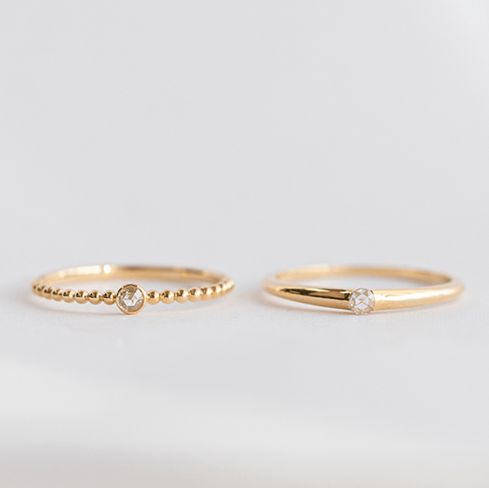 左：「ルプルナ」リング　右：「ルアンナ」リング