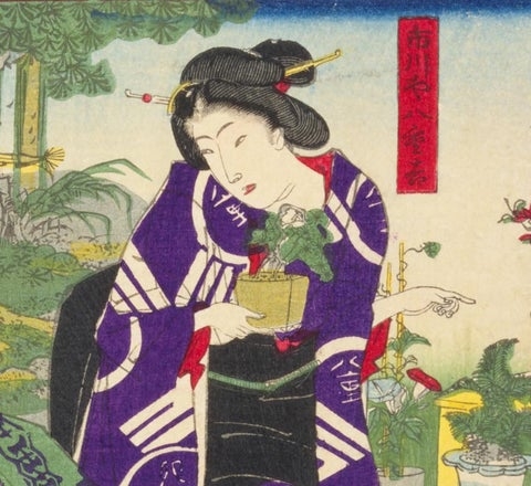 下緒を帯締めに、目貫を帯留めにしている。  出典:『市川や八重吉・若松浜吉・旅籠町若松桃吉』(国立国会図書館)