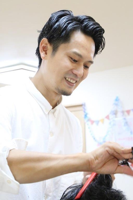 代表 近江谷の訪問の様子