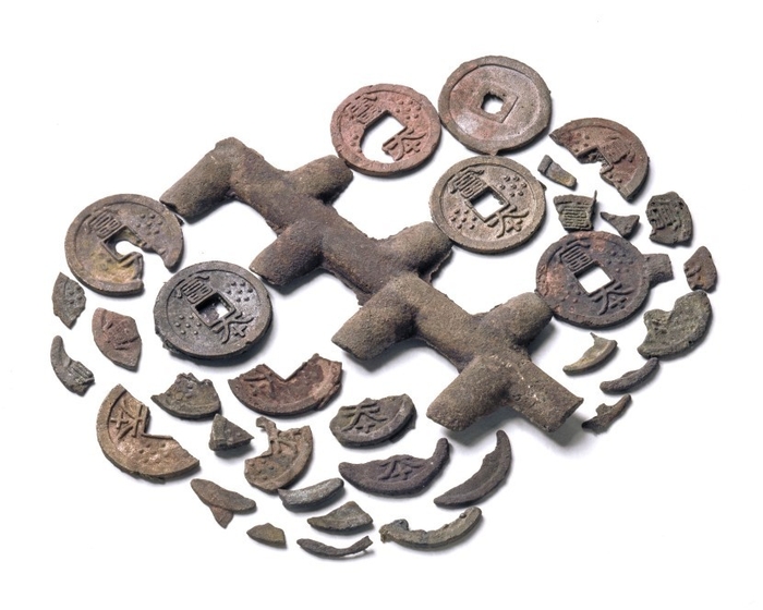 時を超えて伝わる富本銭、飛鳥池遺跡で出土した日本最古の公的な貨幣です