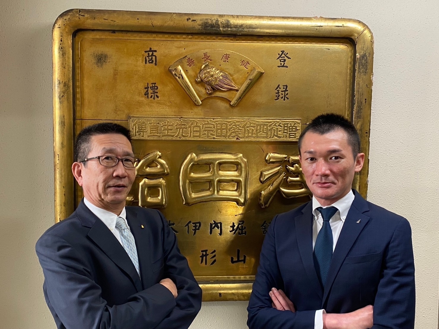(左)代表取締役会長:堀内 邦彦、(右)代表取締役社長:玉木 卓